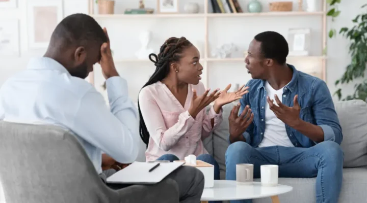 An illustration depicting a diverse couple fighting with each other, engaging in open conversation, symbolizing unhealthy communication and relationships within family dynamics.