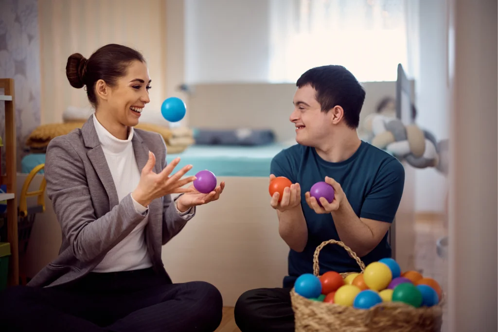 Therapist engaging in a supportive session with a neurodiverse client, using adaptive techniques to foster understanding and communication.