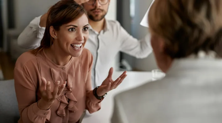 A therapist using active listening skills with a difficult client.